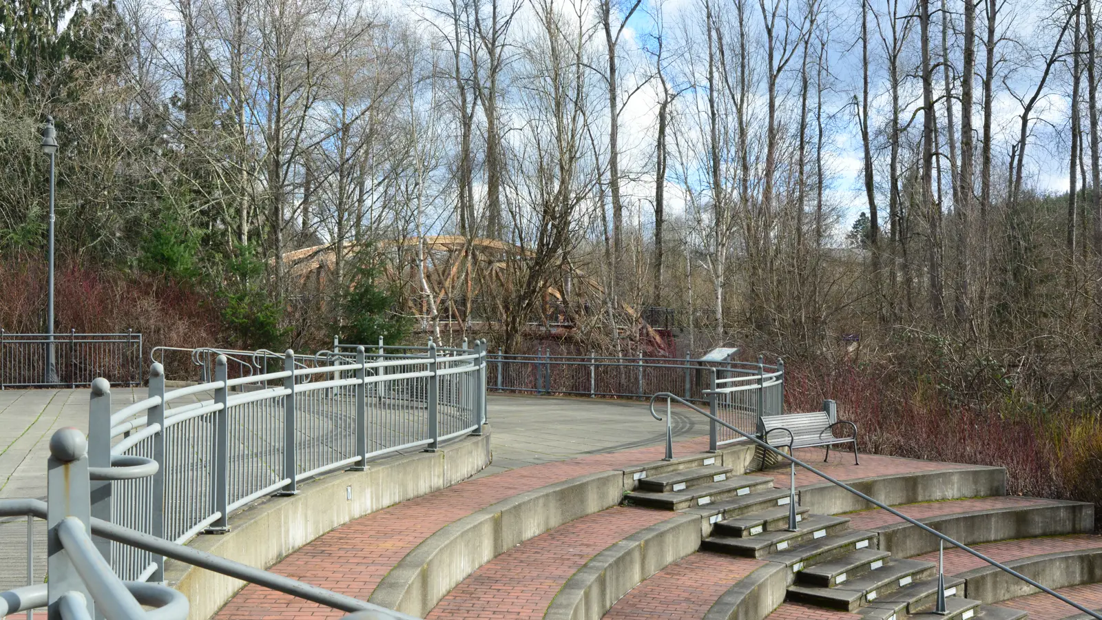 The Park at Bothell Landing, with trees along the Sammamish River.