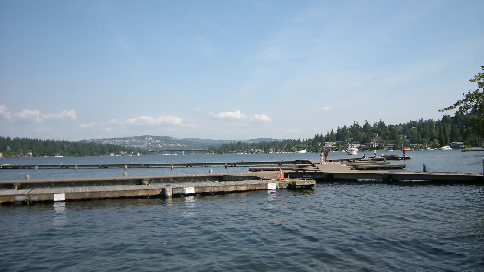 Floating docks at Luther Burbank Park on Mercer Island, with Lake Washington beyond.
